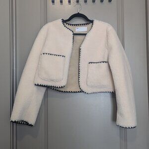 ASOS DESIGN bonded borg collarless jacket with contrast stitch in cream